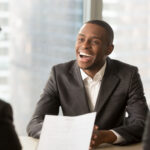 Smiling candidate at a US Immigration Interview.